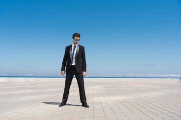 Handsome businessman with elegant suit outdoors portrait