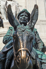Sancho Panza, on his donkey, the famous statue at Plaza de Espana of Madrid, Spain. He is the...