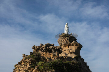 Statue of the Virgin Mary at Rocher de la Vierge in Biarritz, France, Europe, bay of biscay