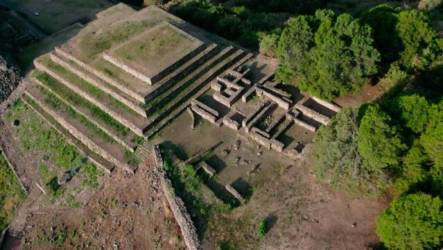 Purepecha Piramid in Mexico, the drone fly over the mountain at sunrice to reveal the piramid
