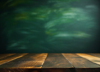 Empty wooden table over green chalkboard background for product display
