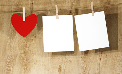 Valentine's Day background. Red heart with blank note paper hanging on a clothesline with clothespins on wooden wall. 3D render illustration.