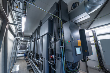 Lithium bromide absorption heat pump in a power plant