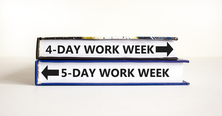 5 or 4 day week symbol. Concept word 5-day work week or 4-day work week on beautiful books. Beautiful white table white background. Business and 5 or 4 day week concept. Copy space.