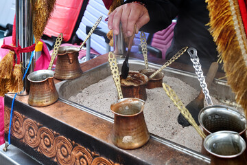 Ember Turkish coffee. Roasted Turkish coffee. Traditional nubian coffee making. Coffee turk on the coal.