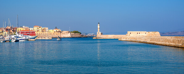 Venetian harbour and lighthouse in Chania. Crete, Greece - obrazy, fototapety, plakaty