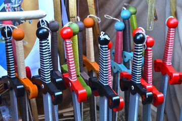 medieval market stall with toy swords