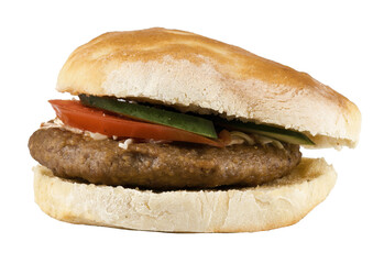 homemade hamburger with bun, tomato and cucumber isolated on white or transparent background