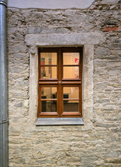 Fototapeta na wymiar old facade with new window