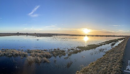 Panoramic sunset over the river. Outside