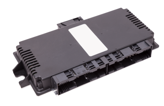 Metallic car engine control unit with plastic elements on a white isolated background is connecting center of various subsystems, units and assemblies. Monitoring the state of the moment. Spare part.