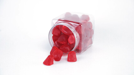 Collagen gummies in transparent jar with white background
