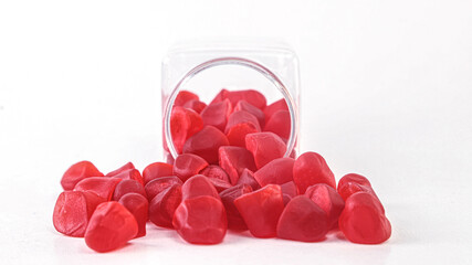 Red collagen gummies ahead with white background.