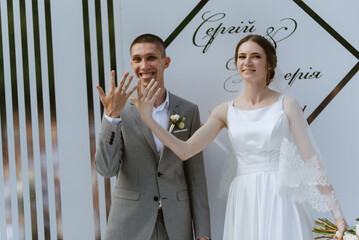 wedding ceremony of the newlyweds on the glade