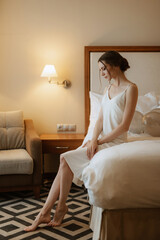 preparations for the bride with the dressing of the wedding dress