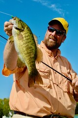 Angler with a smallmouth bass 