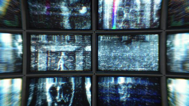 Wall of CCTV screens with scary distorted footage
