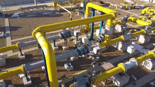 Revolutionizing fluid and gas transportation in industry Aerial view of intertwined yellow pipes embodies industrial innovation highlighting industry efficiency. Enhancing industry standards.