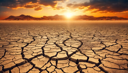 Terra Arsa- Paesaggio Desertico con Terra Screpolata durante un Tramonto Drammatico