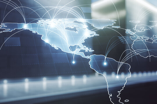 Double exposure of abstract digital world map hologram with connections on contemporary business center exterior background, big data and blockchain concept