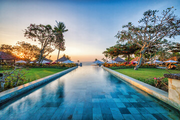 Swimming pool at sunset in Bali, Jimbaran