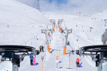 Ski resort. Elevator to the mountain slope. Winter mountain landscape. A place for skiing. High...