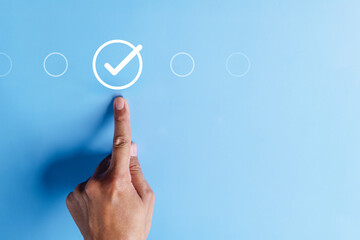approval, approved, check, checkmark, choice, choose, confirm, correct, cross, decision. pointing at correct marks in round via finger on blue background color, the concept of choice without people. - Powered by Adobe