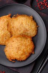 Delicious crispy pancakes made from potatoes, meat, carrots, onions