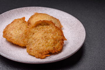 Delicious crispy pancakes made from potatoes, meat, carrots, onions