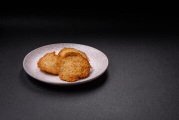 Delicious crispy pancakes made from potatoes, meat, carrots, onions