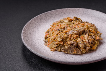 Delicious boiled beef or pork tongue sliced with carrots, onions, sour cream and spices