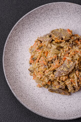 Delicious boiled beef or pork tongue sliced with carrots, onions, sour cream and spices