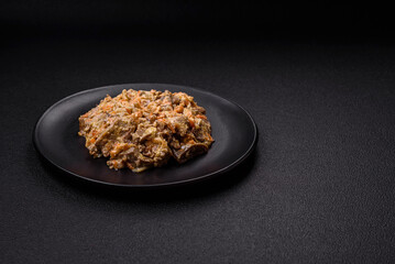 Delicious boiled beef or pork tongue sliced with carrots, onions, sour cream and spices