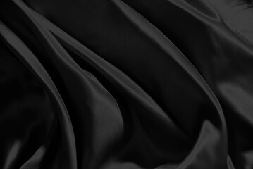 Black silk fabric wave of textile background