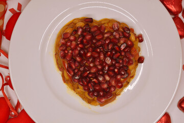 Valentine's Day is February 14th. Red hearts in all types.
Salad Pomegranate heart. Engagement.