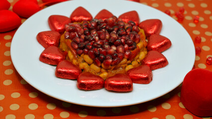 Valentine's Day is February 14th. Red hearts in all types.
Salad Pomegranate heart. Engagement.