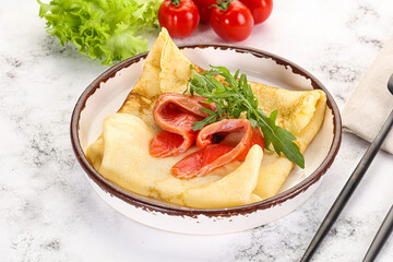 Russian pancake with salmon fish