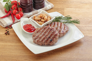 Grilled beef burger cutlet with sauce