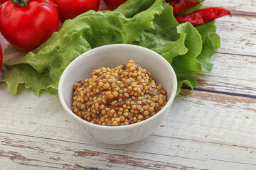 Mustard seeds sauce in the bowl