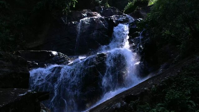 Waterfall in the Sinharaja rainforest in Sri Lanka. Top view, aerial video filming.