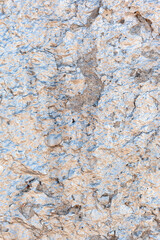 Old concrete glitter wall grunge background or texture with a pink tint. Vertical photo