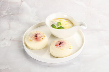 Curd pancakes with sour cream