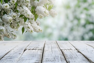 Naklejka na ściany i meble an empty light wooden table top against the background of a beautiful spring landscape with blooming branches of delicate white lilac in close-up, product presentation design concept, layout