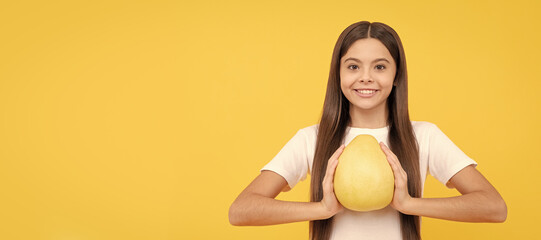 cheerful teen girl hold big citrus fruit of yellow pomelo full of vitamin, diet. Child girl portrait with pomelo grapefruit orange, horizontal poster. Banner header with copy space.