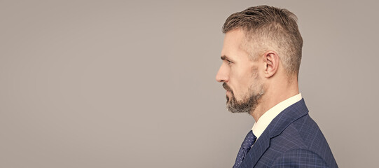 Man face portrait, banner with copy space. mature boss in profile. confident businessman. mature...