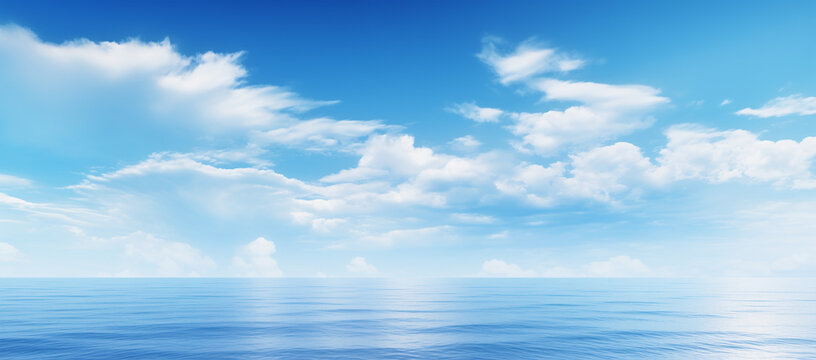 Peaceful heaven like seascape. Ocean and sky meet at horizon. Blue ocean and blue sky with white clouds. 