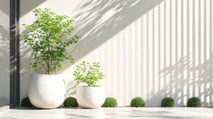  a couple of white vases sitting next to each other on top of a white floor next to a planter with a green plant growing on top of it.