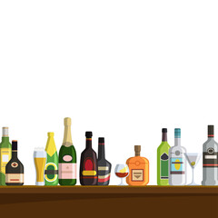Bottles alcohol drinks in glass bottles standing on bar shelves