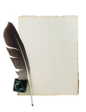 Vintage paper sheet with feather and ink bottle 