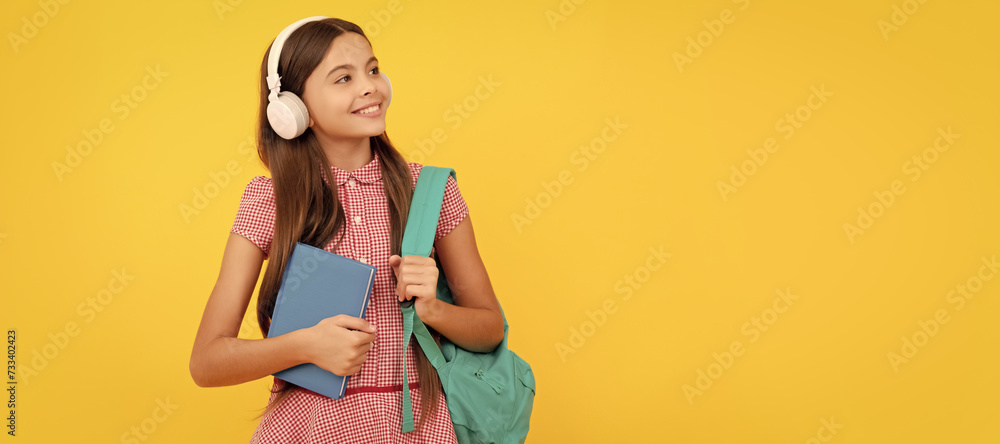 Poster happy school child in headphones carry backpack and workbook, ebook. banner of schoolgirl student. s